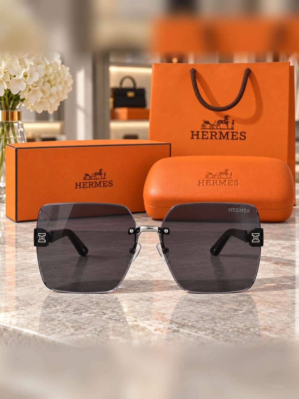 Hermes Rimless Silver H Sunglasses